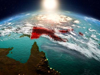 Sunrise yukarıda Papua Yeni Gine modeli görünür ülke sınırları ile uzayda Dünya gezegeninin bir kırmızı vurgulanır. 3D çizim. Nasa tarafından döşenmiş bu görüntü unsurları.