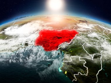 Sunrise modeli görünür ülke sınırları ile uzayda Dünya gezegeninin bir Kırmızı vurgulanır Nijerya yukarıda. 3D çizim. Nasa tarafından döşenmiş bu görüntü unsurları.