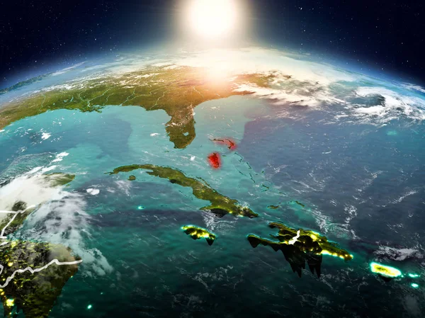 Sunrise modeli görünür ülke sınırları ile uzayda Dünya gezegeninin bir kırmızı vurgulanır Bahamalar yukarıda. 3D çizim. Nasa tarafından döşenmiş bu görüntü unsurları.