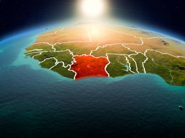 Sunrise yukarıda Fildişi Sahili modeli görünür ülke sınırları ile uzayda Dünya gezegeninin bir kırmızı vurgulanır. 3D çizim. Nasa tarafından döşenmiş bu görüntü unsurları.