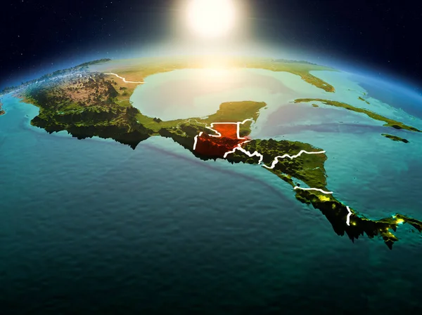 Sunrise modeli görünür ülke sınırları ile uzayda Dünya gezegeninin bir Kırmızı vurgulanır Guatemala yukarıda. 3D çizim. Nasa tarafından döşenmiş bu görüntü unsurları.