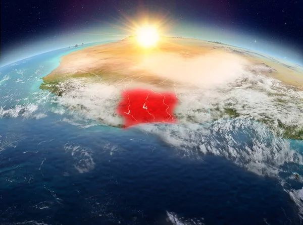 コートジボワール日の出中に雲と地球の赤で強調表示の衛星ビュー イラスト Nasa から提供されたこのイメージの要素 — ストック写真