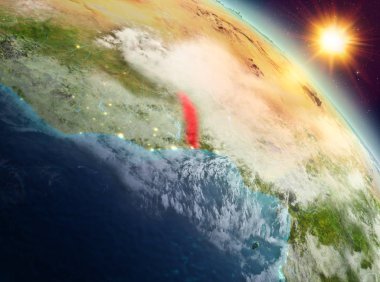 Sunrise modeli gezegeninin uzaydaki bir kırmızı vurgulanır Togo yukarıda. 3D çizim. Nasa tarafından döşenmiş bu görüntü unsurları.