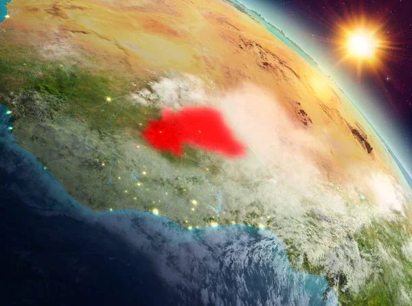 Sunrise yukarıda Burkina Faso modeli gezegeninin uzaydaki bir kırmızı vurgulanır. 3D çizim. Nasa tarafından döşenmiş bu görüntü unsurları.