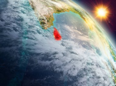 Sunrise yukarıda Sri Lanka modeli gezegeninin uzaydaki bir kırmızı vurgulanır. 3D çizim. Nasa tarafından döşenmiş bu görüntü unsurları.