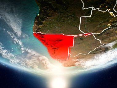 Namibya Sunrise son derece detaylı yüzey dokuları ve görünür ülke sınırları ile Dünya gezegeninin yörüngeden. 3D çizim. Nasa tarafından döşenmiş bu görüntü unsurları.