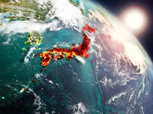 Sunset above Japan from space on planet Earth with visible country borders. 3D illustration. Elements of this image furnished by NASA.