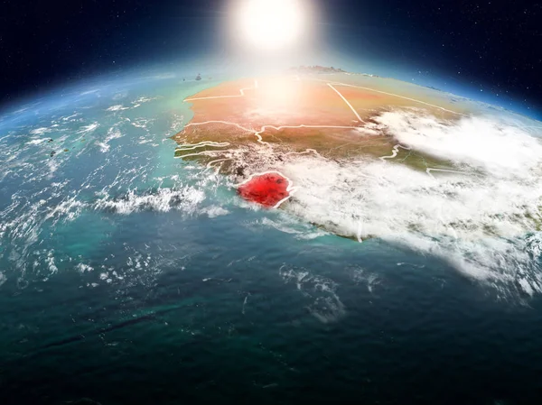 Sunrise yukarıda Sierra Leone modeli görünür ülke sınırları ile uzayda Dünya gezegeninin bir kırmızı vurgulanır. 3D çizim. Nasa tarafından döşenmiş bu görüntü unsurları.