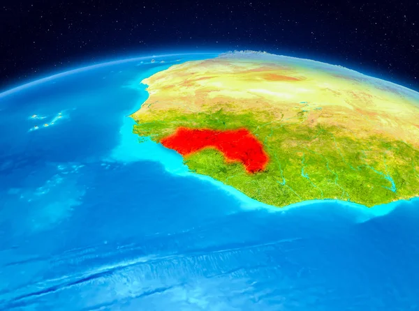 Satellite view of Guinea highlighted in red on planet Earth. 3D illustration. Elements of this image furnished by NASA.
