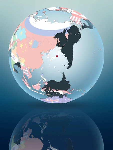 Japan on political globe reflecting on shiny surface. 3D illustration.