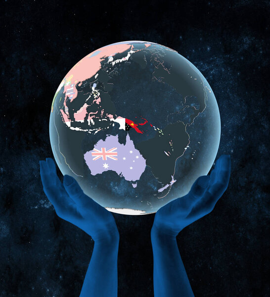 Papua New Guinea on translucent political globe in hands in space. 3D illustration.