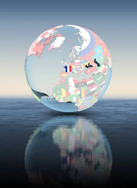 France on political globe floating above water. 3D illustration.