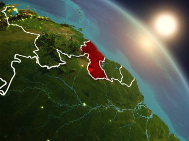Günbatımı Guyana Planet Earth görünür ülke sınırları ile uzaydan yukarıda. 3D çizim. Nasa tarafından döşenmiş bu görüntü unsurları.