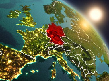 Günbatımı Almanya Planet Earth görünür ülke sınırları ile uzaydan yukarıda. 3D çizim. Nasa tarafından döşenmiş bu görüntü unsurları.