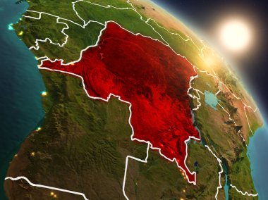 Sunset above Democratic Republic of Congo from space on planet Earth with visible country borders. 3D illustration. Elements of this image furnished by NASA. clipart