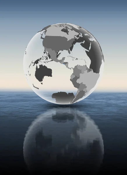 萨尔瓦多在水面上半透明的地球仪上有旗帜 — 图库照片
