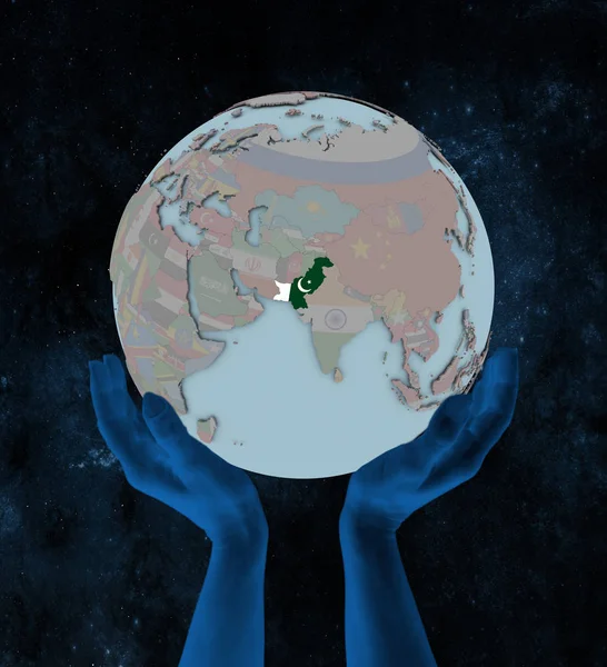 Pakistan with flag on globe in hands in space. 3D illustration.