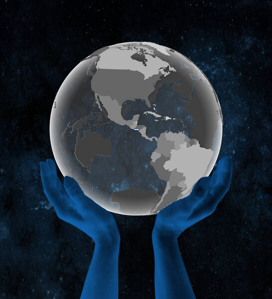 El Salvador With flag on translucent globe in hands in space. 3D illustration.