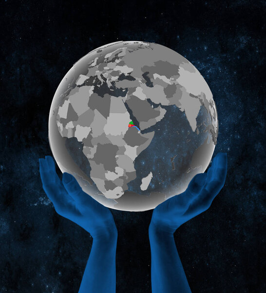 Eritrea With flag on translucent globe in hands in space. 3D illustration.