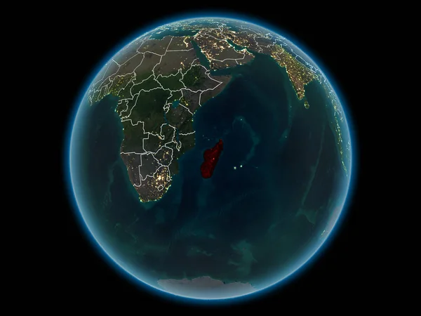 Madagascar in red with visible country borders and city lights from space at night. 3D illustration. Elements of this image furnished by NASA.