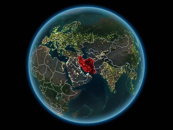 Iran in red with visible country borders and city lights from space at night. 3D illustration. Elements of this image furnished by NASA.