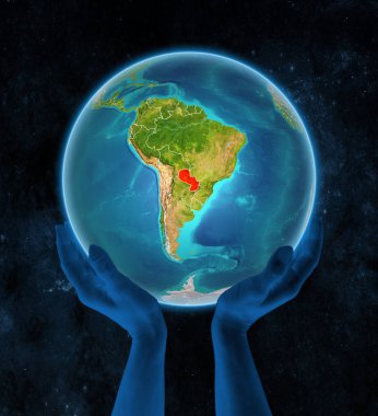 Paraguay Planet Earth ile görünür ülke sınırları uzayda elinde. 3D çizim.