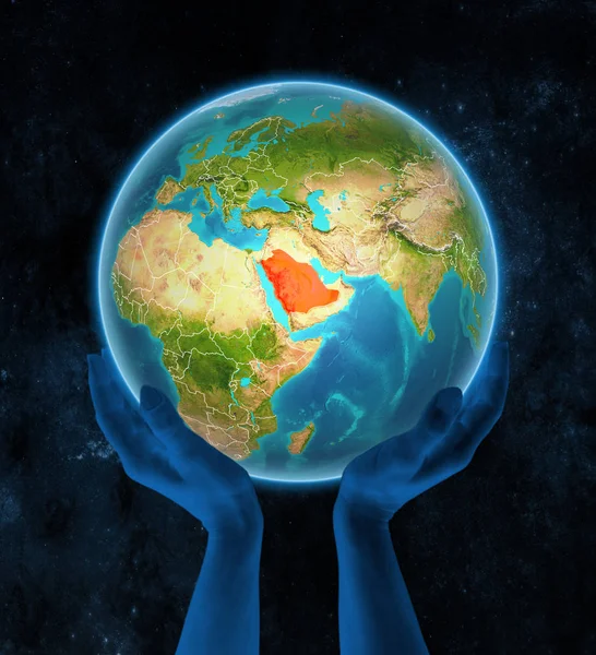 Saudi Arabia Maapallolla Näkyvä Maa Rajoja Käsissä Avaruudessa Kuva — kuvapankkivalokuva