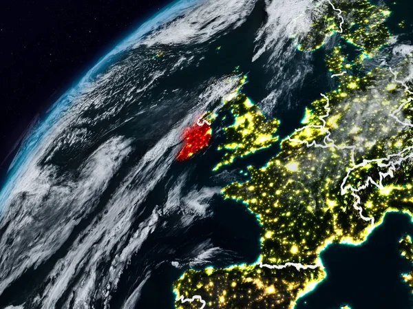 Ireland on planet Earth at night with visible country borders. 3D illustration. Elements of this image furnished by NASA.