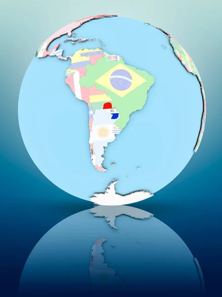 Paraguay on political globe with national flags on reflective surface. 3D illustration.