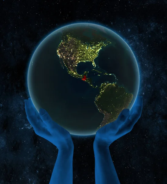夜地球空間での手の中にグアテマラ イラストレーション — ストック写真