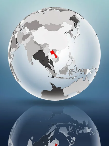 Laos on globe with translucent oceans on shiny surface. 3D illustration.