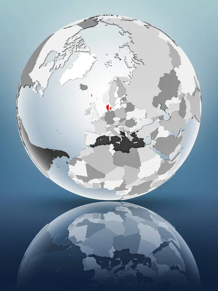 Denmark on globe with translucent oceans on shiny surface. 3D illustration.