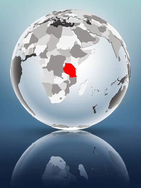 Tanzania on globe with translucent oceans on shiny surface. 3D illustration.