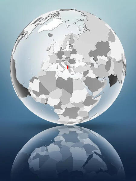 Albania on globe with translucent oceans on shiny surface. 3D illustration.