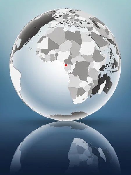 Equatorial Guinea on globe with translucent oceans on shiny surface. 3D illustration.