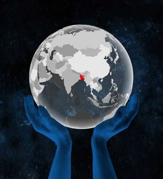 Bangladesh on translucent globe in hands in space. 3D illustration.