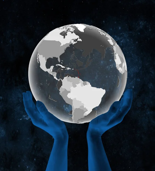 Caribbean on translucent globe in hands in space. 3D illustration.