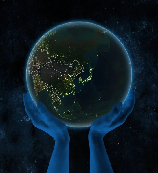 Pohjois Korea Yöllä Planeetta Earth Näkyvä Maa Rajoja Käsissä Avaruudessa — kuvapankkivalokuva