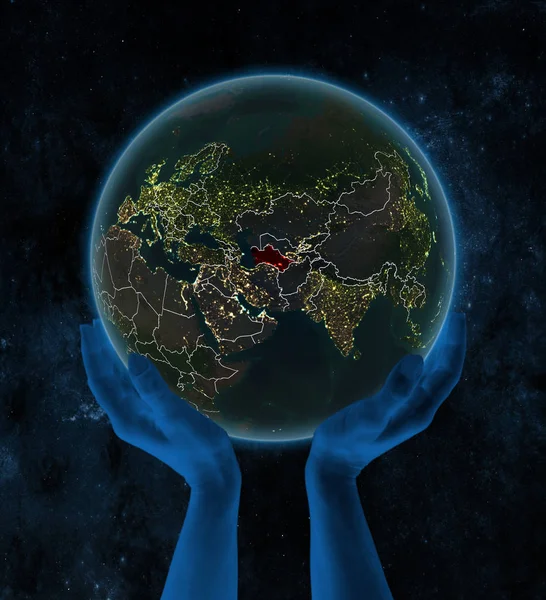 Turquemenistão Planeta Terra Noturna Com Fronteiras País Visíveis Nas Mãos — Fotografia de Stock