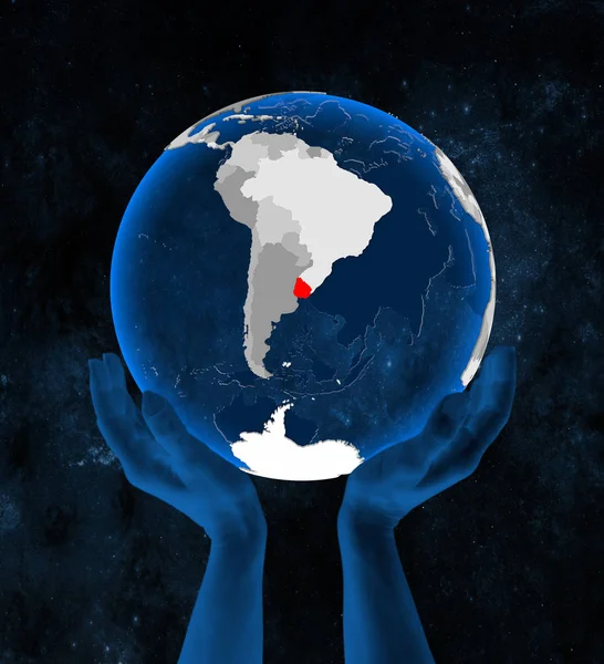 Uruguay on translucent blue globe held in hands in space. 3D illustration.