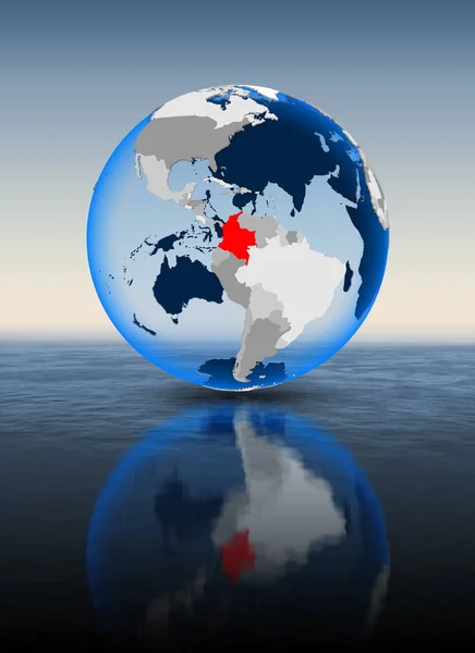 Colombia In red on globe floating in water. 3D illustration.