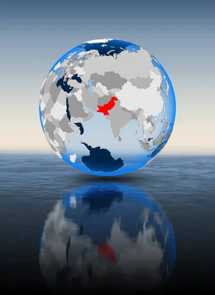 Pakistan In red on globe floating in water. 3D illustration.