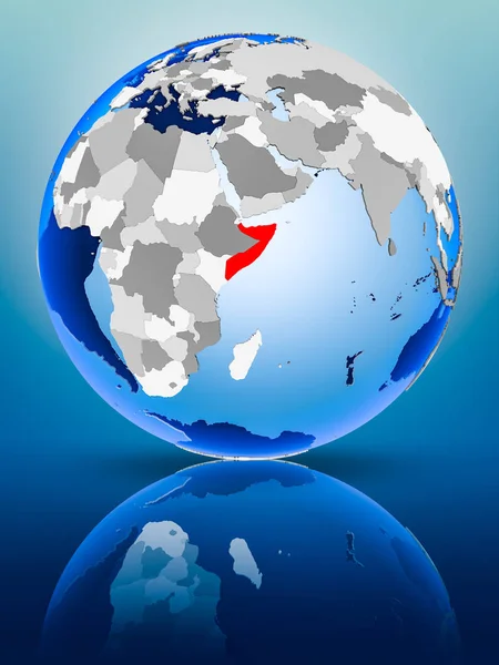 Somalia on political globe standing on reflective surface. 3D illustration.