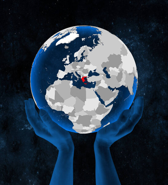 Greece on translucent blue globe held in hands in space. 3D illustration.