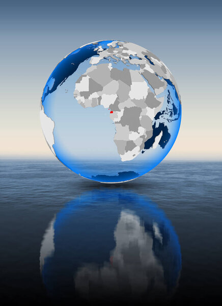 Equatorial Guinea In red on globe floating in water. 3D illustration.