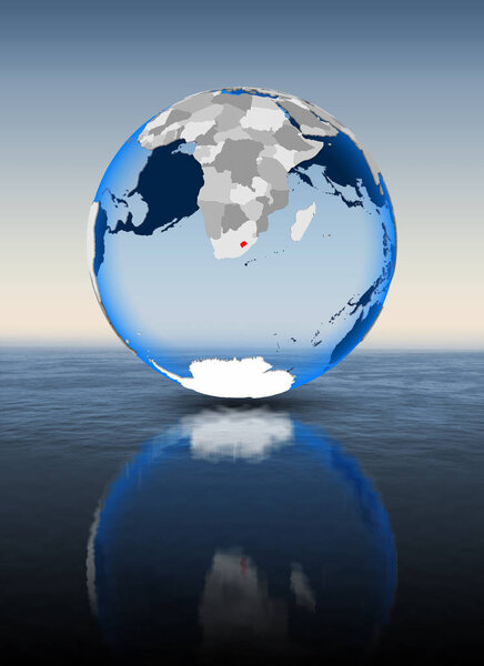 Lesotho In red on globe floating in water. 3D illustration.