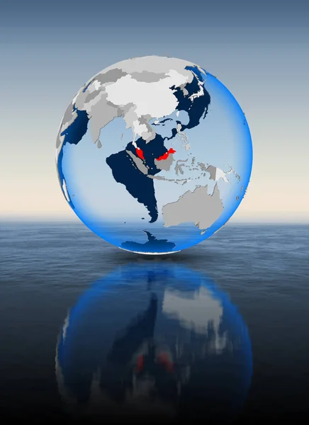 Malaysia In red on globe floating in water. 3D illustration.