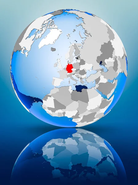 Germany on political globe standing on reflective surface. 3D illustration.
