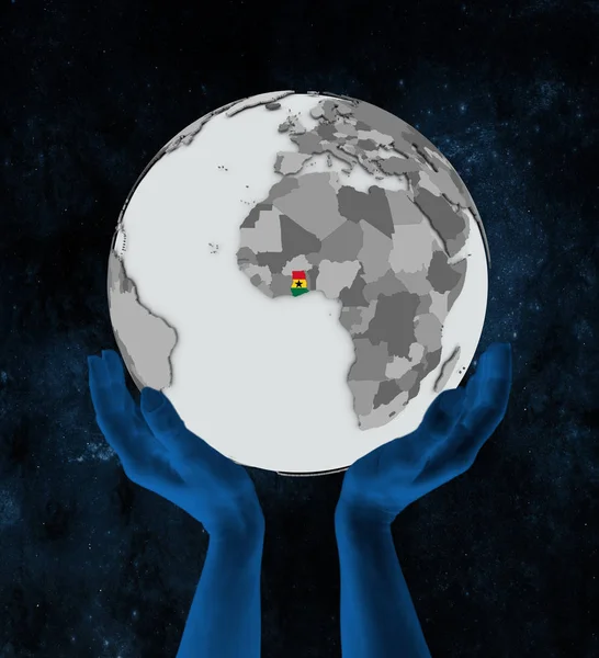 Ghana with flag on globe in hands in space. 3D illustration.