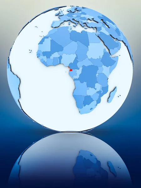 在反射表面上的蓝色地球仪上的赤道几内亚 — 图库照片